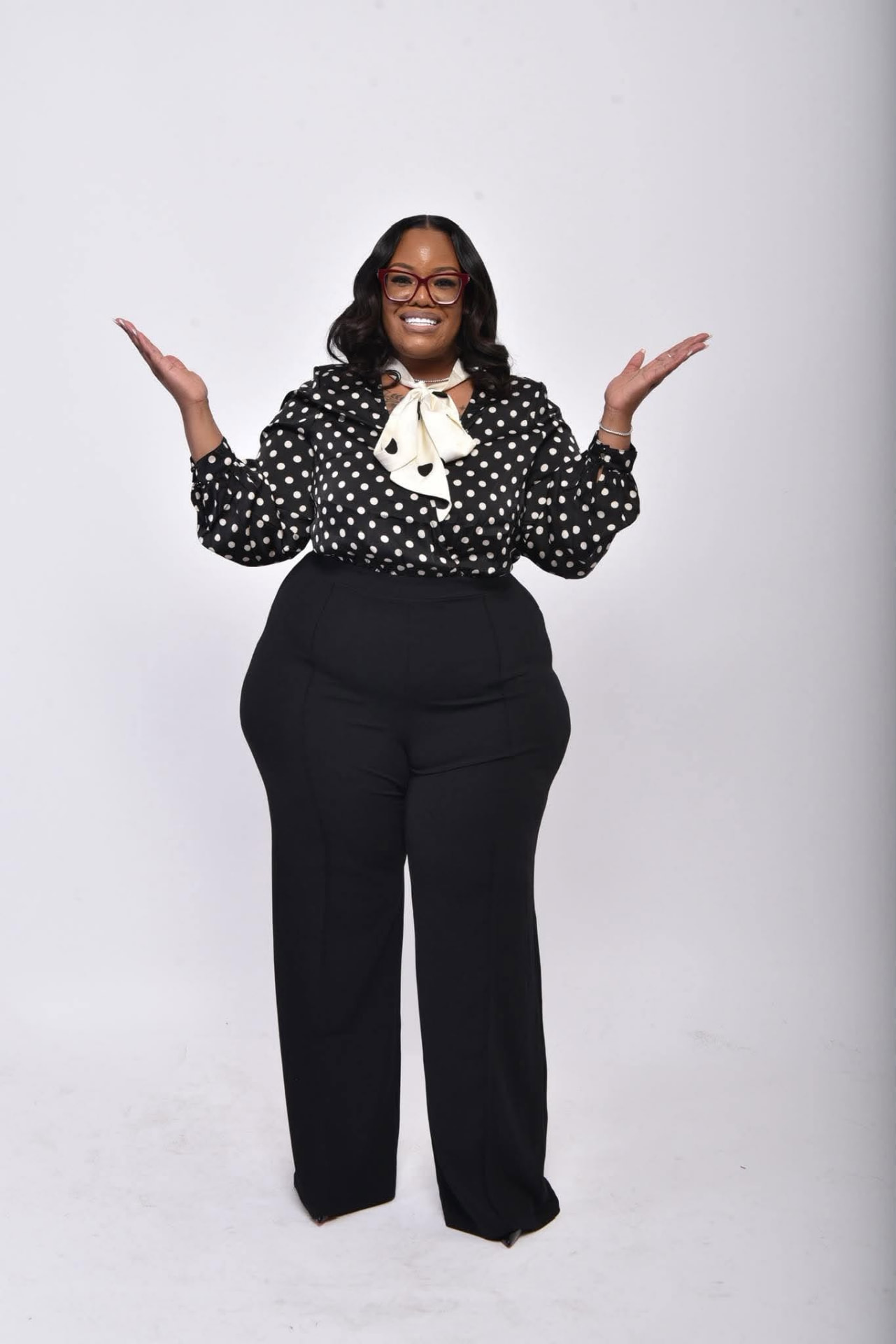 Kenisha Johnson, founder of The Legacy Tax Solutions, welcoming clients
