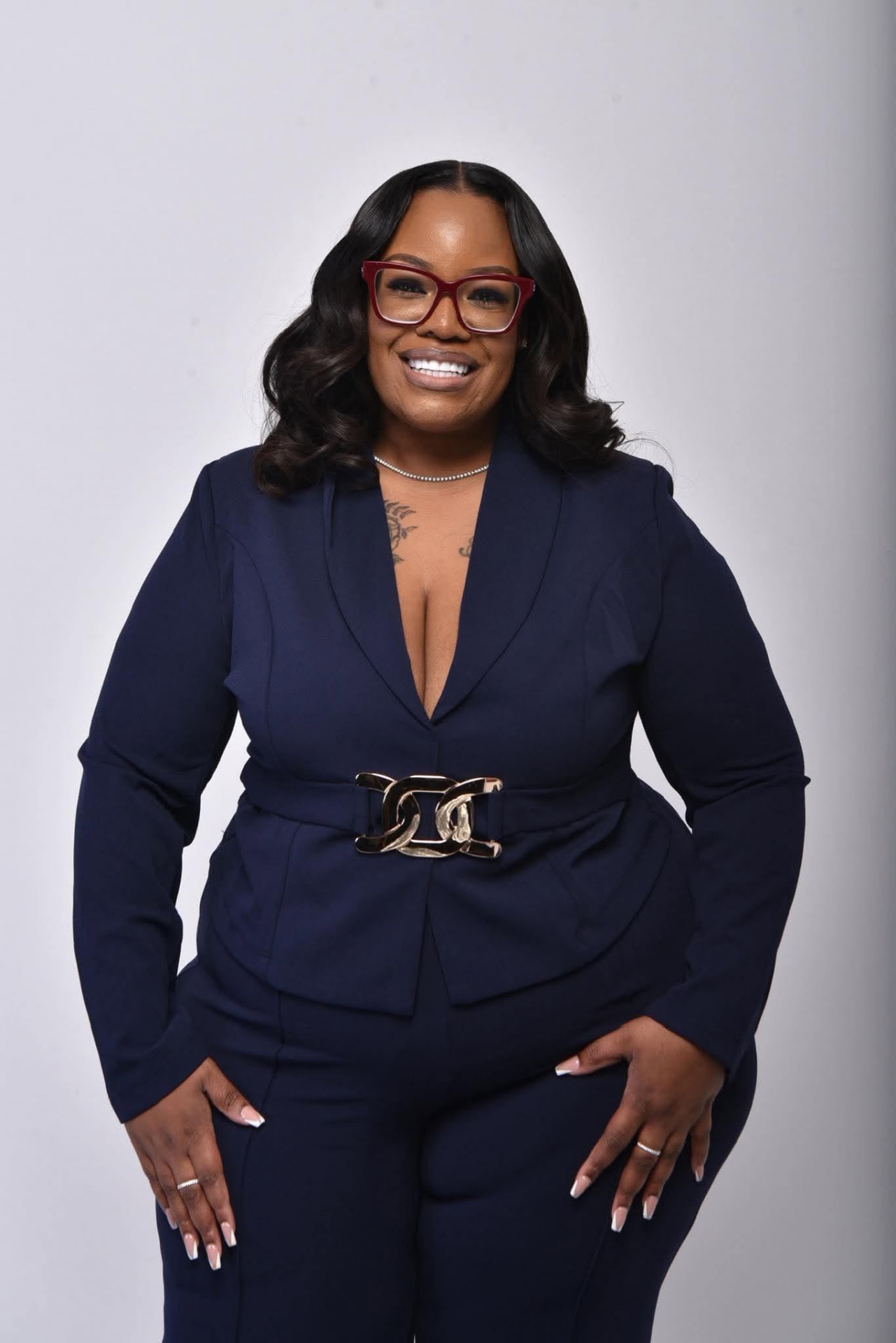 Kenisha Johnson, founder of The Legacy Tax Solutions, in a navy suit